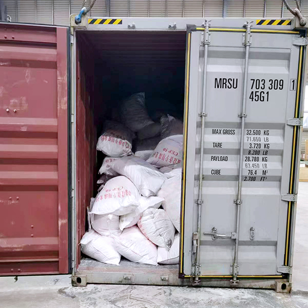 Expédition de sable nacré vers la Thaïlande chargée avec succès grâce à une stratégie de double conteneur